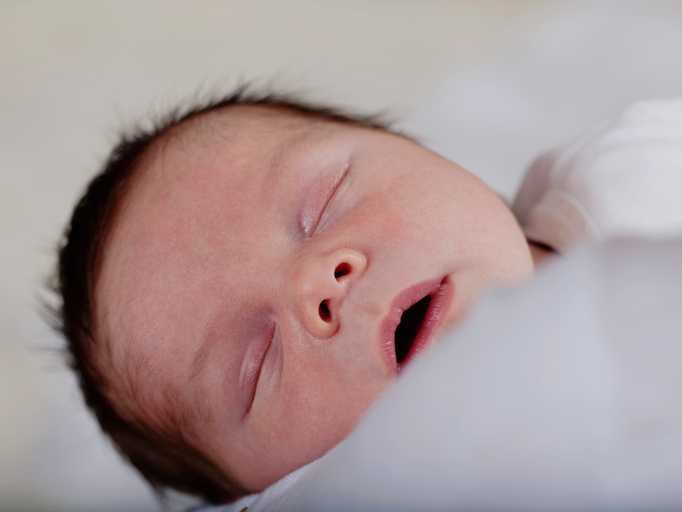 Close up of infants sleeping face