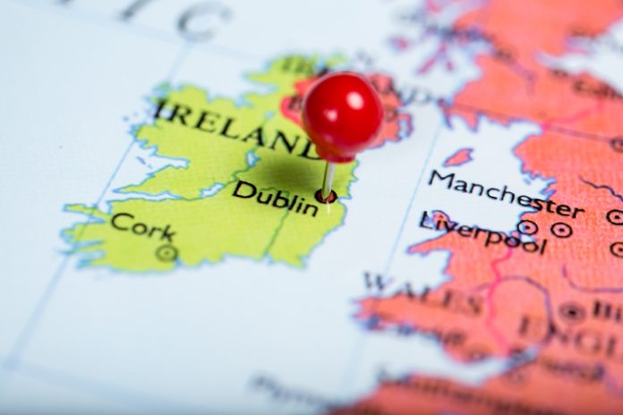 Red push pin on map of Ireland