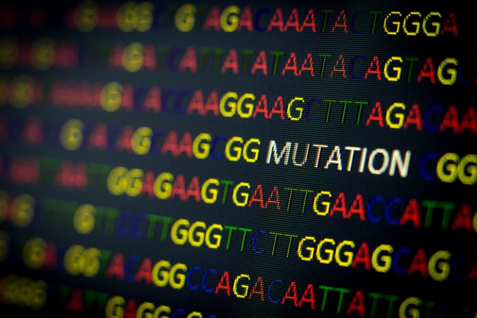 DNA sequence with colored letters on black background containing mutation