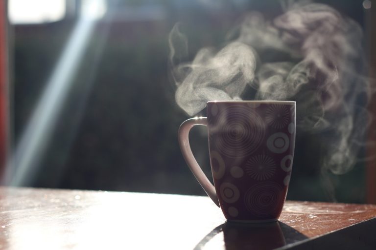 Mug with sunlight and steam