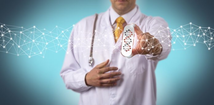 Doctor in a white coat holding a digital pill containing DNA to represent differences in drug metabolism for psychedelic drugs