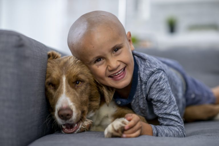 Smiling Boy with his Dog