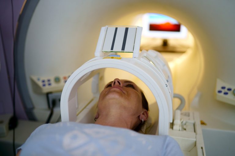 Inside tube of MRI scanner women receiving an MRI Scan.