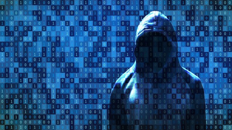 Digital Composite Image Of Computer Hacker With Binary Codes