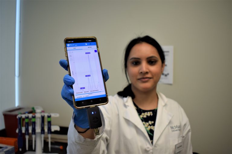 McMaster University researcher Richa Pandey displays new technology that can analyze a medical sample and return an accurate, definitive result in minutes.