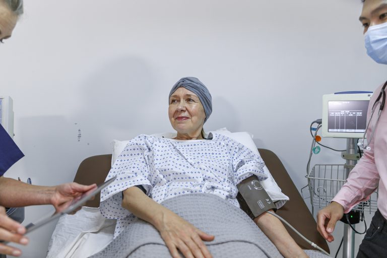 Hospitalized cancer patient undergoing chemotherapy.