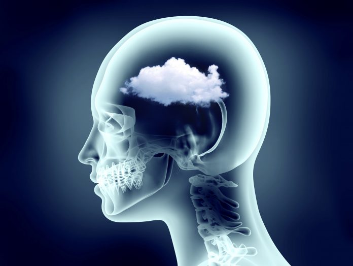 xray image of human head with cloud inside to illustrate the effect of air pollution on the brain