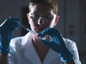 Scientist preparing injection