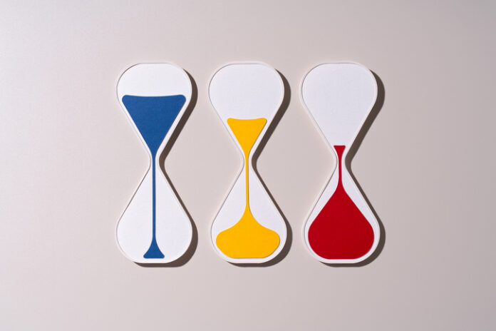 2258225159 Blue Yellow and Red Hourglasses Representing Task Priority Levels
